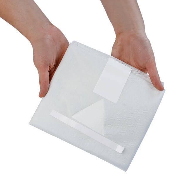 Покриття 140х80cm(см), з адгезивним трикутним вирізом 15х15х15cm(см), ламінований спанбонд 45g/m2(г/м2), стерильне, одноразового використання,ТМ «АХІЛЛ»